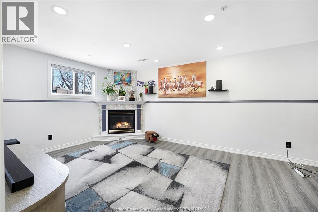3812 Devonwood Avenue, Windsor, ON - Indoor Photo Showing Living Room With Fireplace