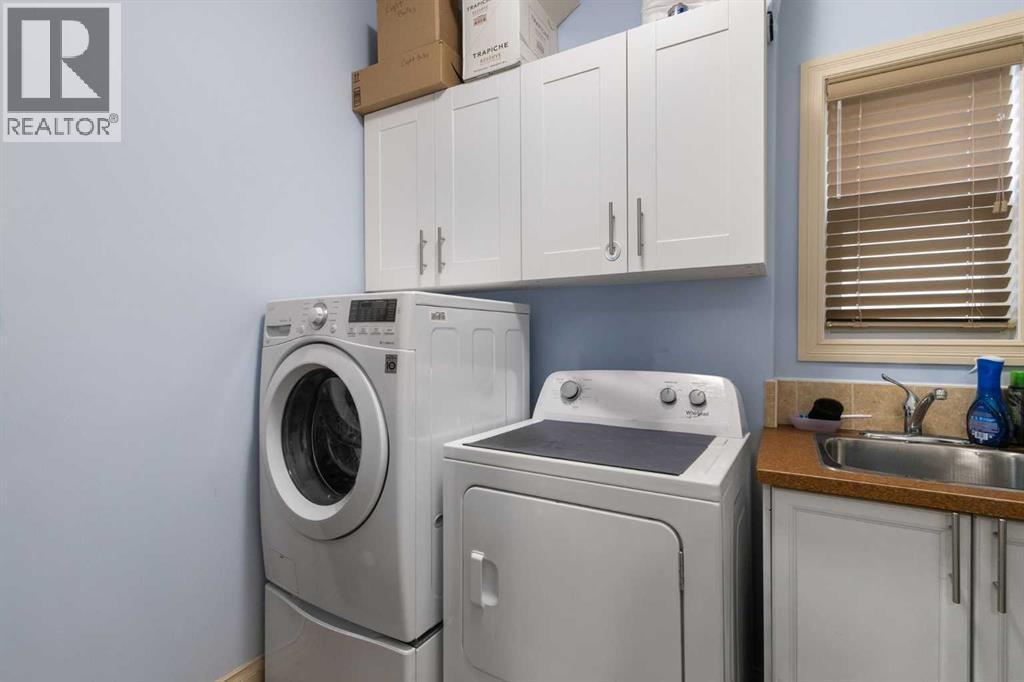 72 Rockyspring Circle Nw, Calgary, AB - Indoor Photo Showing Laundry Room