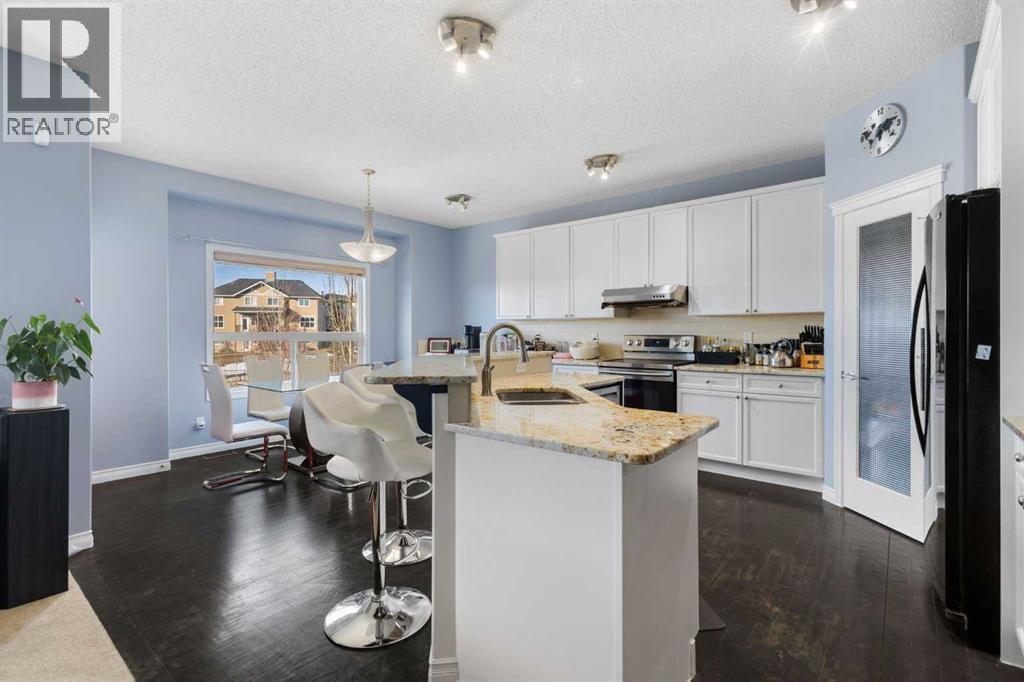72 Rockyspring Circle Nw, Calgary, AB - Indoor Photo Showing Kitchen With Double Sink With Upgraded Kitchen