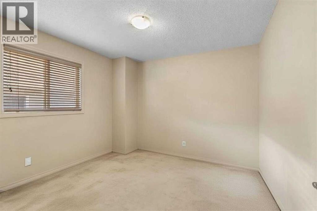 72 Rockyspring Circle Nw, Calgary, AB - Indoor Photo Showing Other Room
