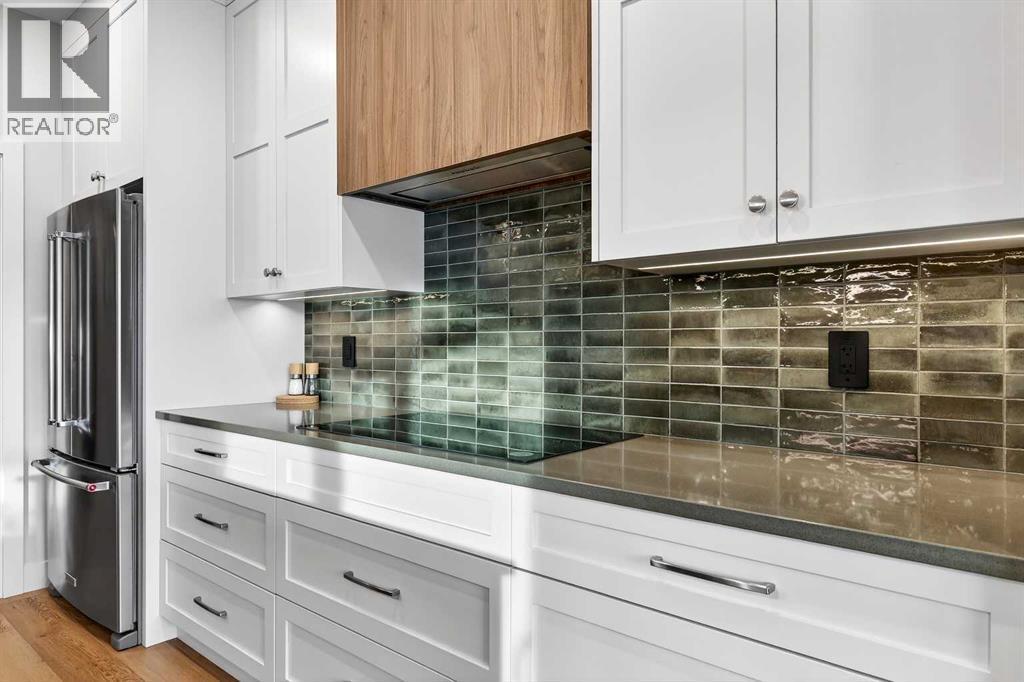 Subway Tile Backsplash - 24 Napoleon Meadows Way, Innisfail, AB - Indoor Photo Showing Kitchen With Upgraded Kitchen