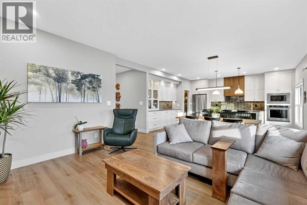 1036 sqft Main Level - 24 Napoleon Meadows Way, Innisfail, AB - Indoor Photo Showing Living Room