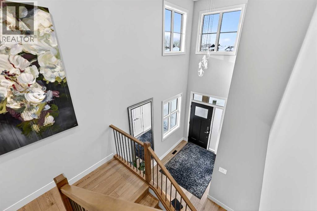 18' Ceiling Height in Foyer - 24 Napoleon Meadows Way, Innisfail, AB - Indoor Photo Showing Other Room