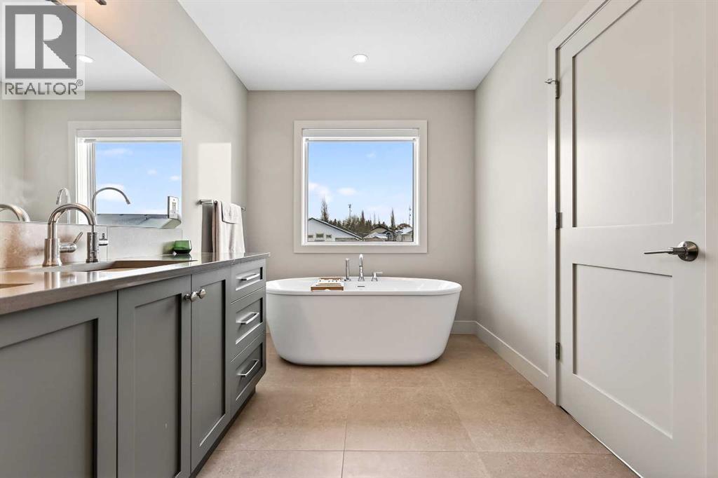 Mirolin Azzura Beacon Freestanding Tub - 24 Napoleon Meadows Way, Innisfail, AB - Indoor Photo Showing Bathroom