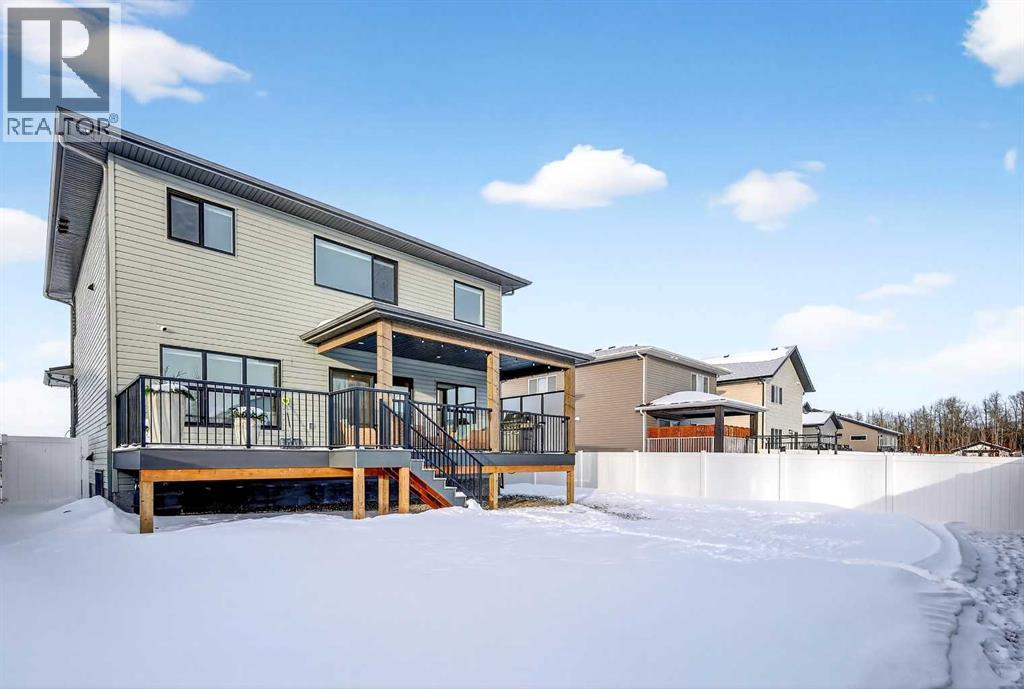 Vinyl Siding - 24 Napoleon Meadows Way, Innisfail, AB - Outdoor With Deck Patio Veranda