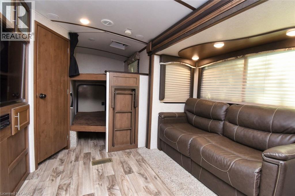 Living area with light wood-style flooring - 1085 10Th Concession Road W Unit# 29, Flamborough, ON - Indoor Photo Showing Other Room