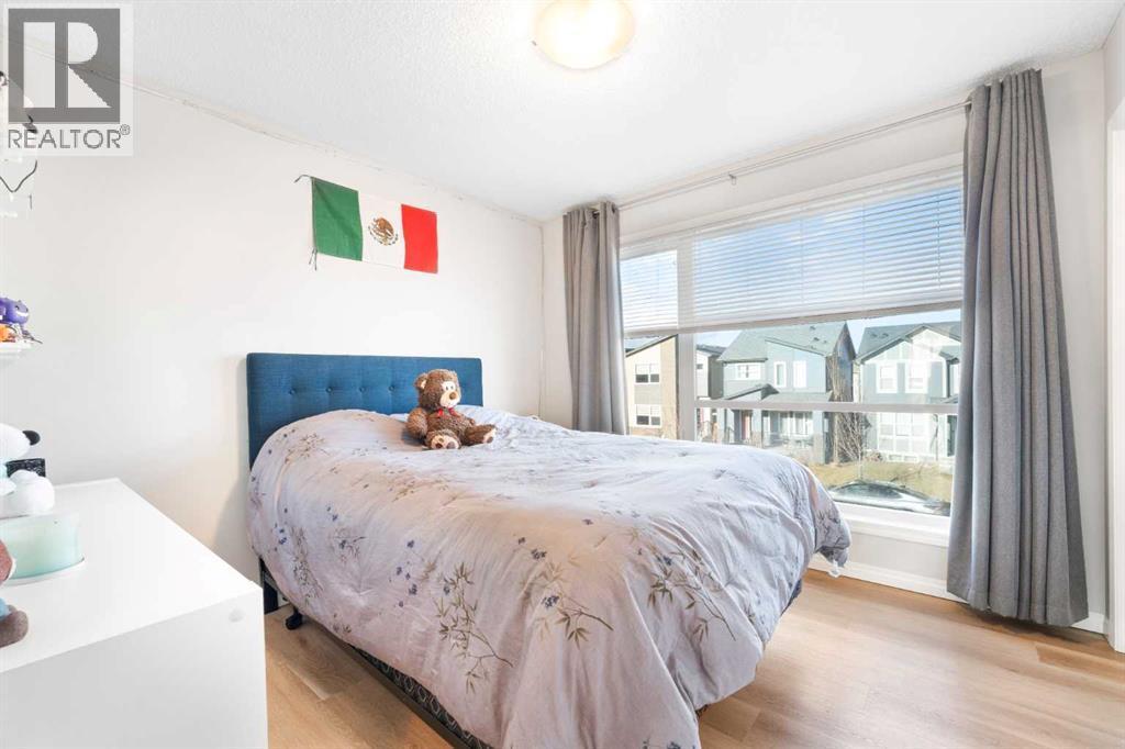 13 Walcrest Way Se, Calgary, AB - Indoor Photo Showing Bedroom