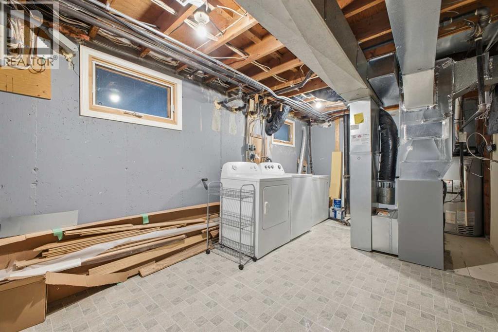 123 Killarney Glen Court Sw, Calgary, AB - Indoor Photo Showing Laundry Room