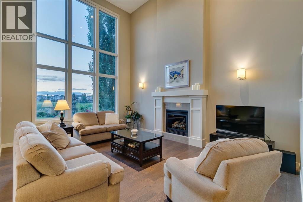 101 Cranarch Common Se, Calgary, AB - Indoor Photo Showing Living Room With Fireplace