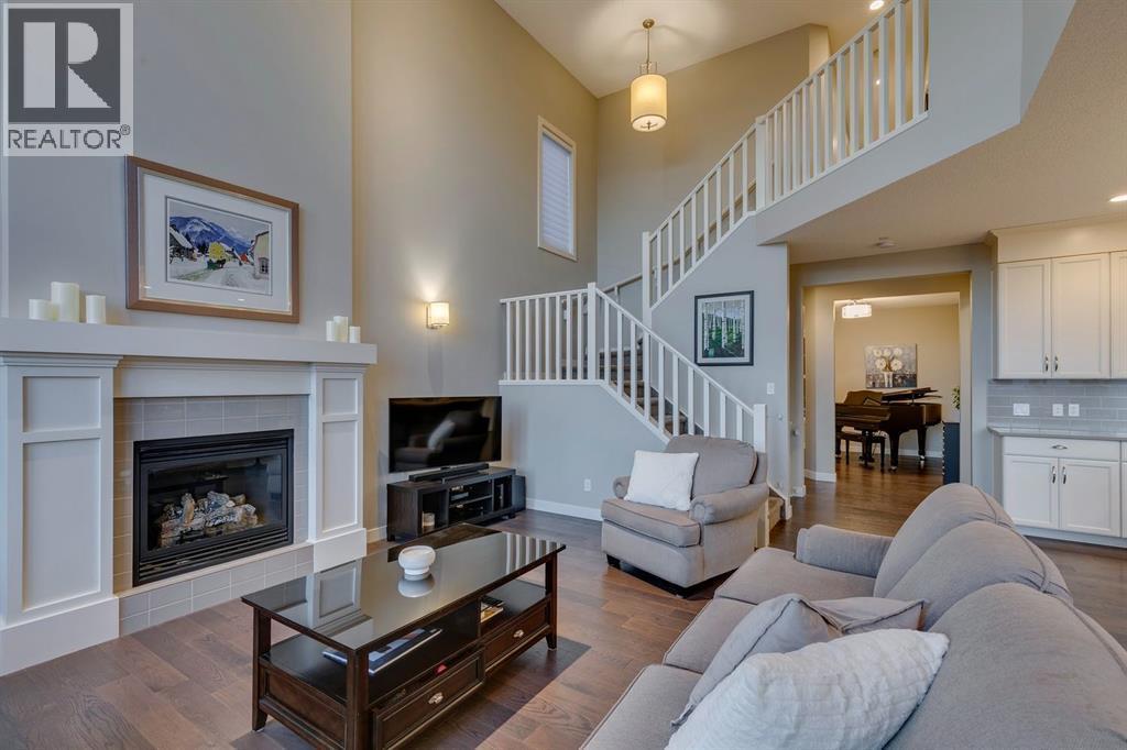 101 Cranarch Common Se, Calgary, AB - Indoor Photo Showing Living Room With Fireplace