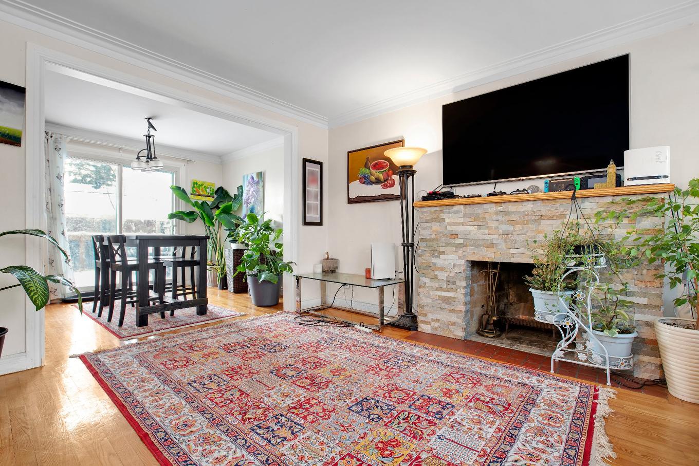Living room - 272 Av. Vinet, Dorval, QC - Indoor Photo Showing Living Room With Fireplace