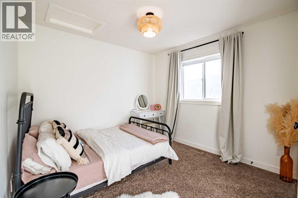 Bedroom 1 - 53 Portway Close, Blackfalds, AB - Indoor Photo Showing Bedroom