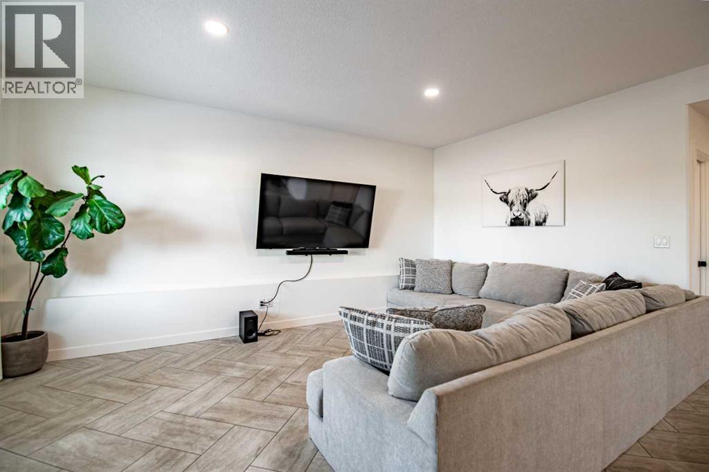 Basement Living Room - 53 Portway Close, Blackfalds, AB - Indoor Photo Showing Living Room