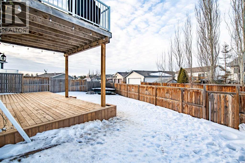 29x14 Lower Deck - 53 Portway Close, Blackfalds, AB - Outdoor With Deck Patio Veranda With Exterior