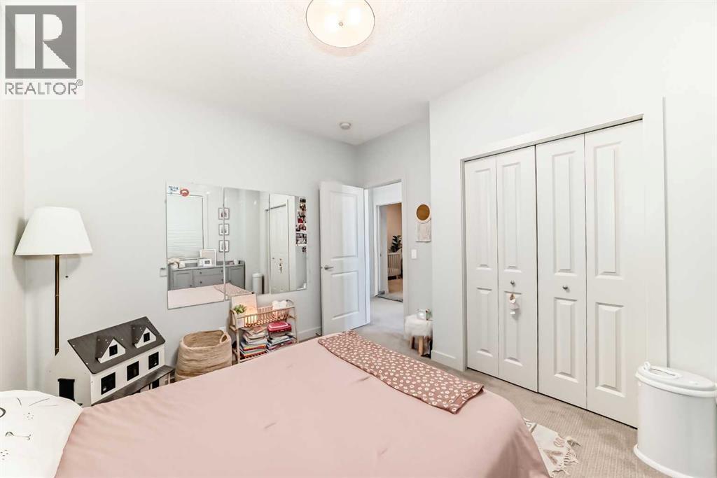 743 Shawnee Drive Sw, Calgary, AB - Indoor Photo Showing Bedroom