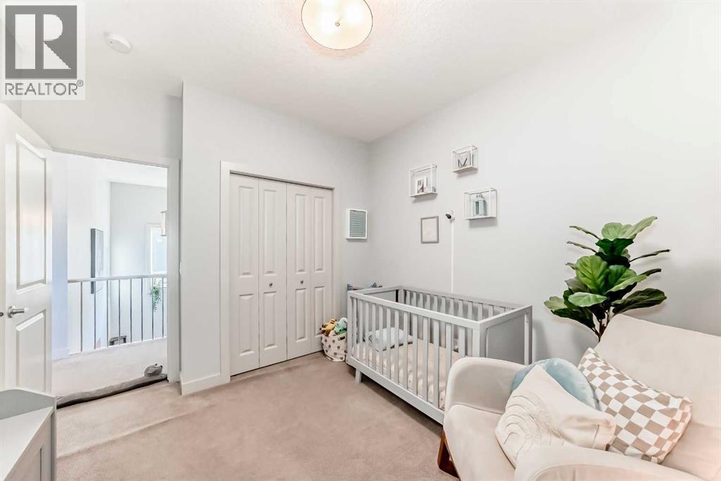743 Shawnee Drive Sw, Calgary, AB - Indoor Photo Showing Bedroom
