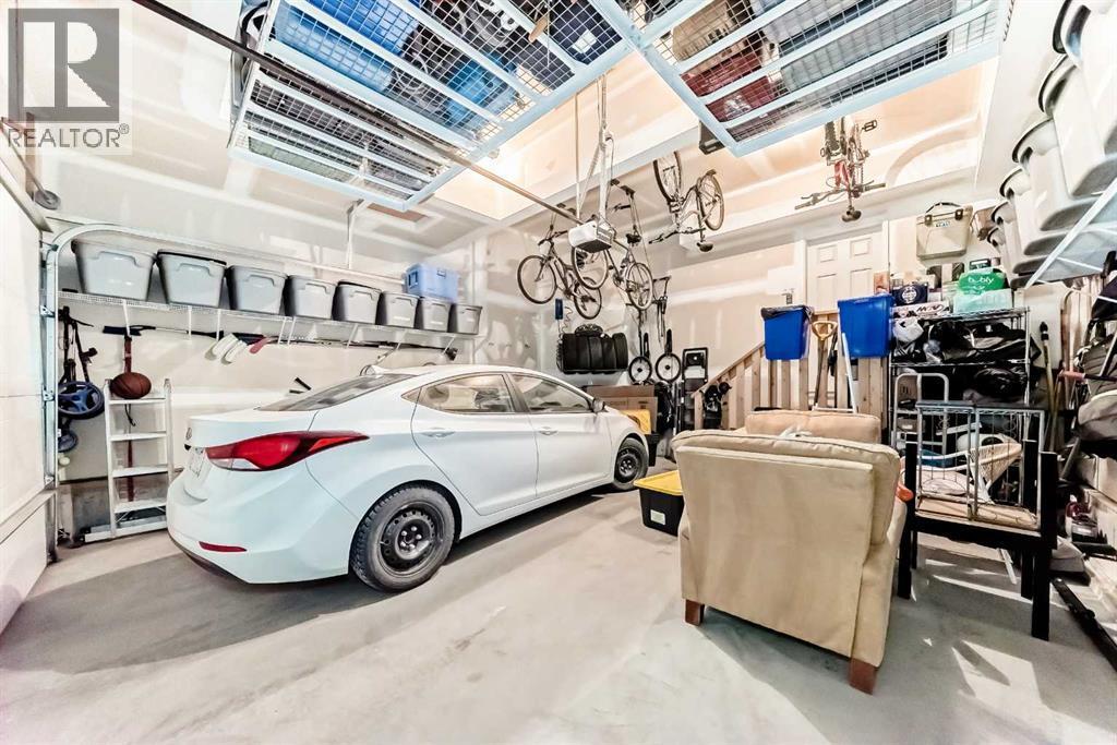 743 Shawnee Drive Sw, Calgary, AB - Indoor Photo Showing Garage