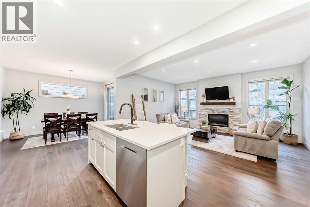 743 Shawnee Drive Sw, Calgary, AB - Indoor With Fireplace