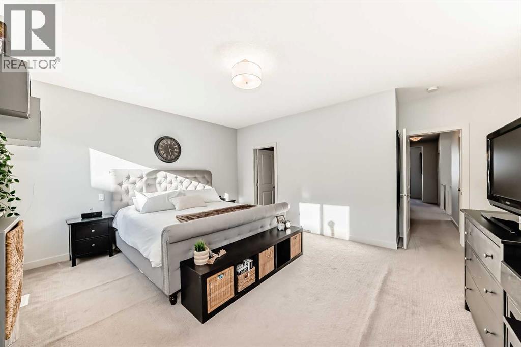 743 Shawnee Drive Sw, Calgary, AB - Indoor Photo Showing Bedroom