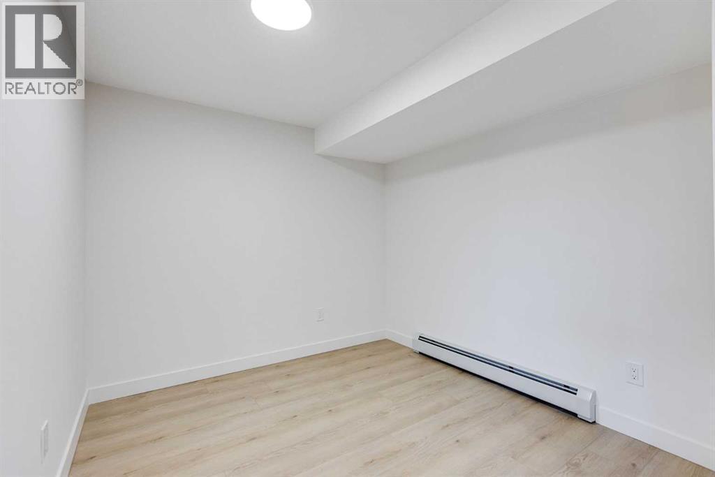 352 Abinger Crescent Ne, Calgary, AB - Indoor Photo Showing Other Room