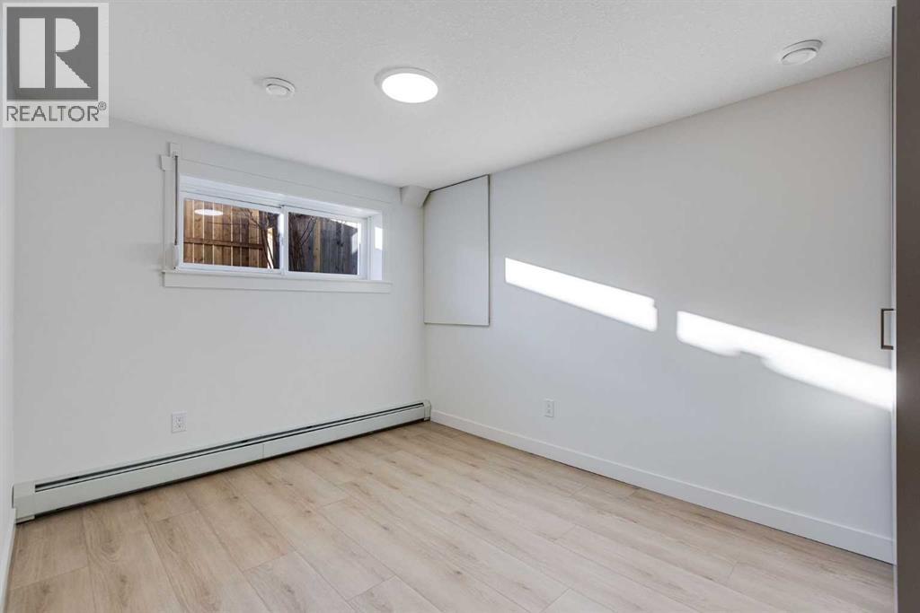 352 Abinger Crescent Ne, Calgary, AB - Indoor Photo Showing Other Room