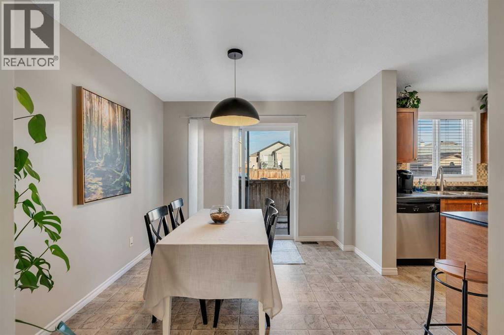 86 Eversyde Common Sw, Calgary, AB - Indoor Photo Showing Dining Room