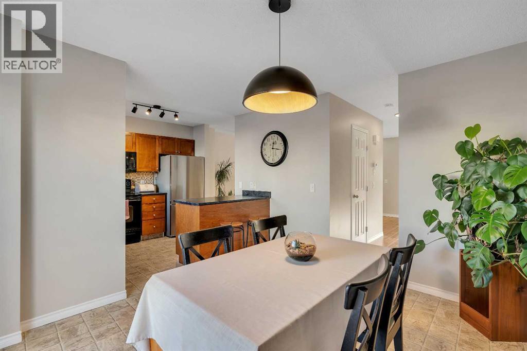 86 Eversyde Common Sw, Calgary, AB - Indoor Photo Showing Dining Room