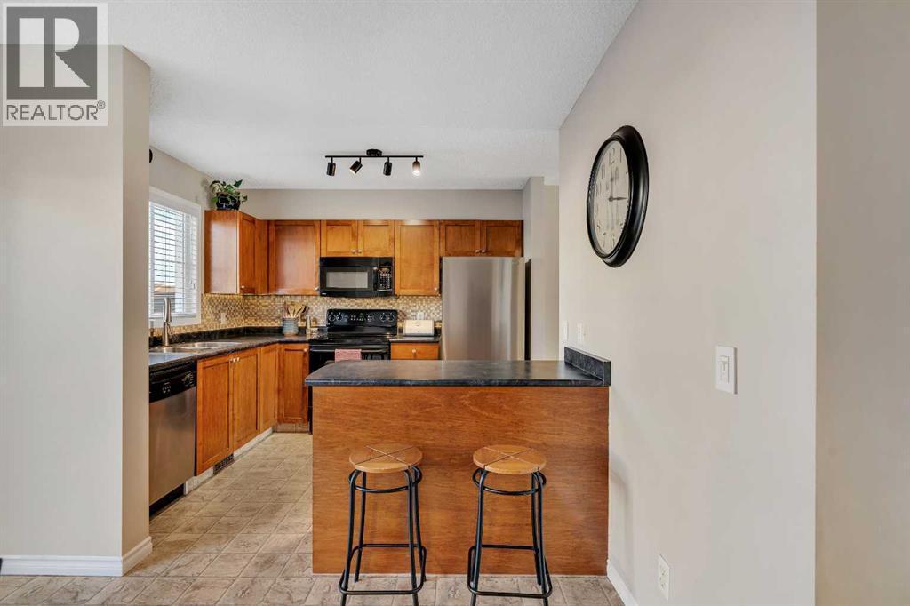 86 Eversyde Common Sw, Calgary, AB - Indoor Photo Showing Kitchen