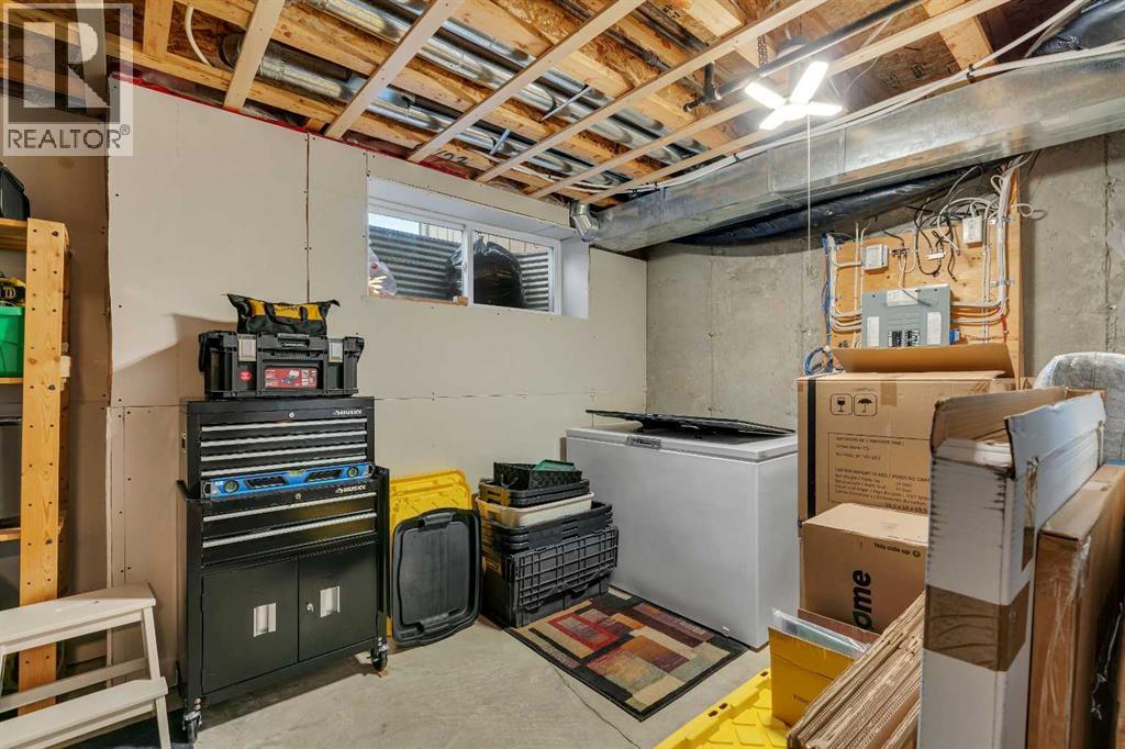 86 Eversyde Common Sw, Calgary, AB - Indoor Photo Showing Basement