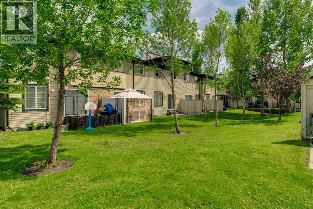 86 Eversyde Common Sw, Calgary, AB - Outdoor With Backyard