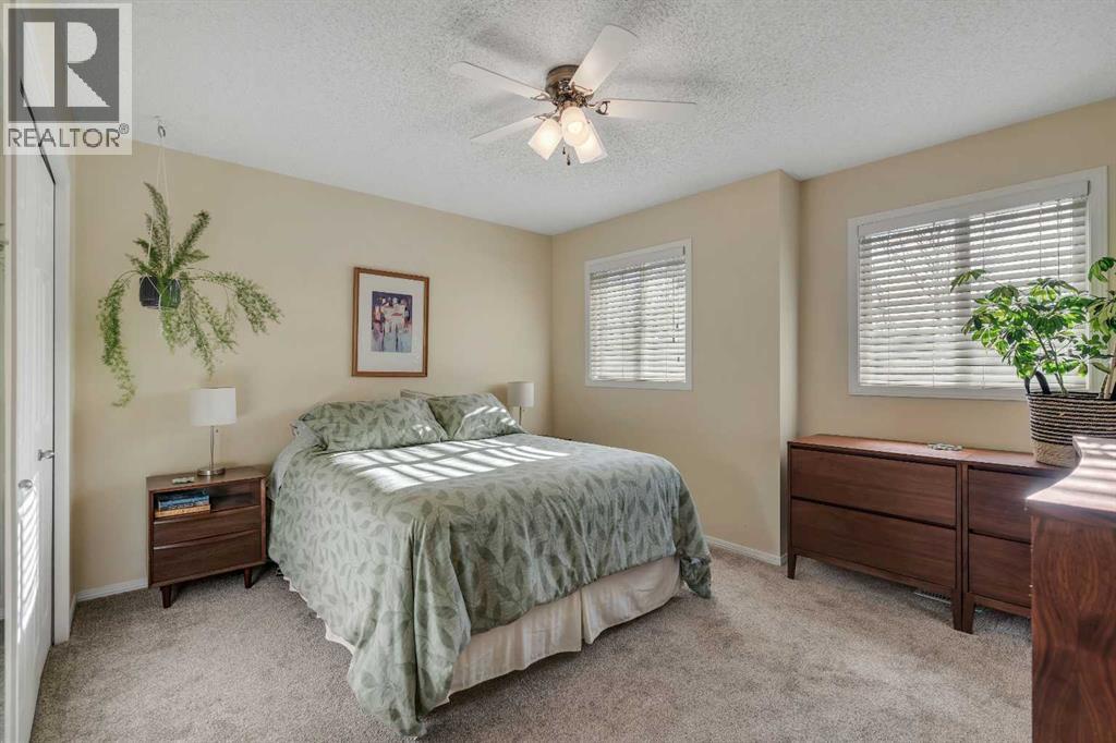 86 Eversyde Common Sw, Calgary, AB - Indoor Photo Showing Bedroom