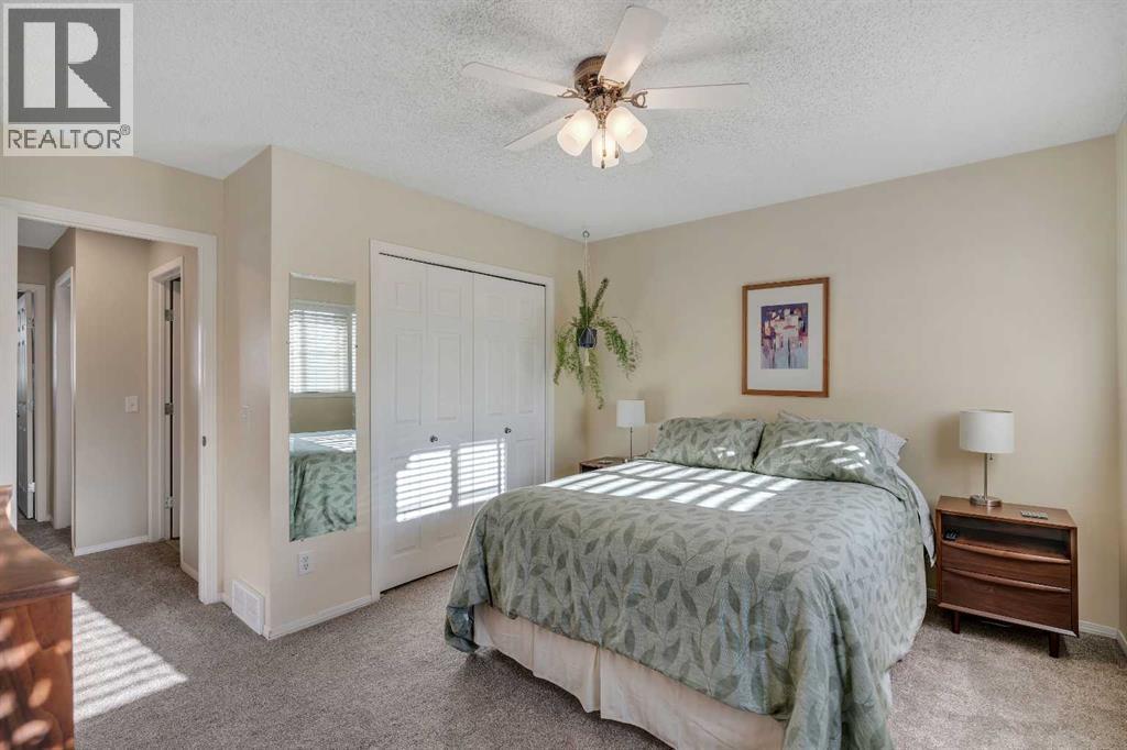 86 Eversyde Common Sw, Calgary, AB - Indoor Photo Showing Bedroom