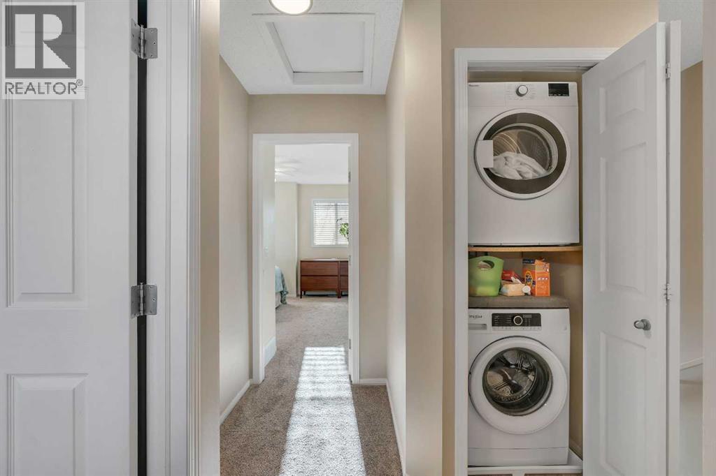 86 Eversyde Common Sw, Calgary, AB - Indoor Photo Showing Laundry Room