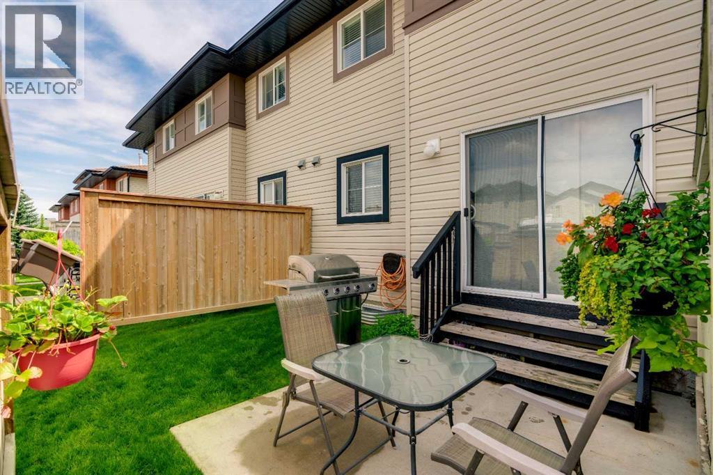 86 Eversyde Common Sw, Calgary, AB - Outdoor With Deck Patio Veranda