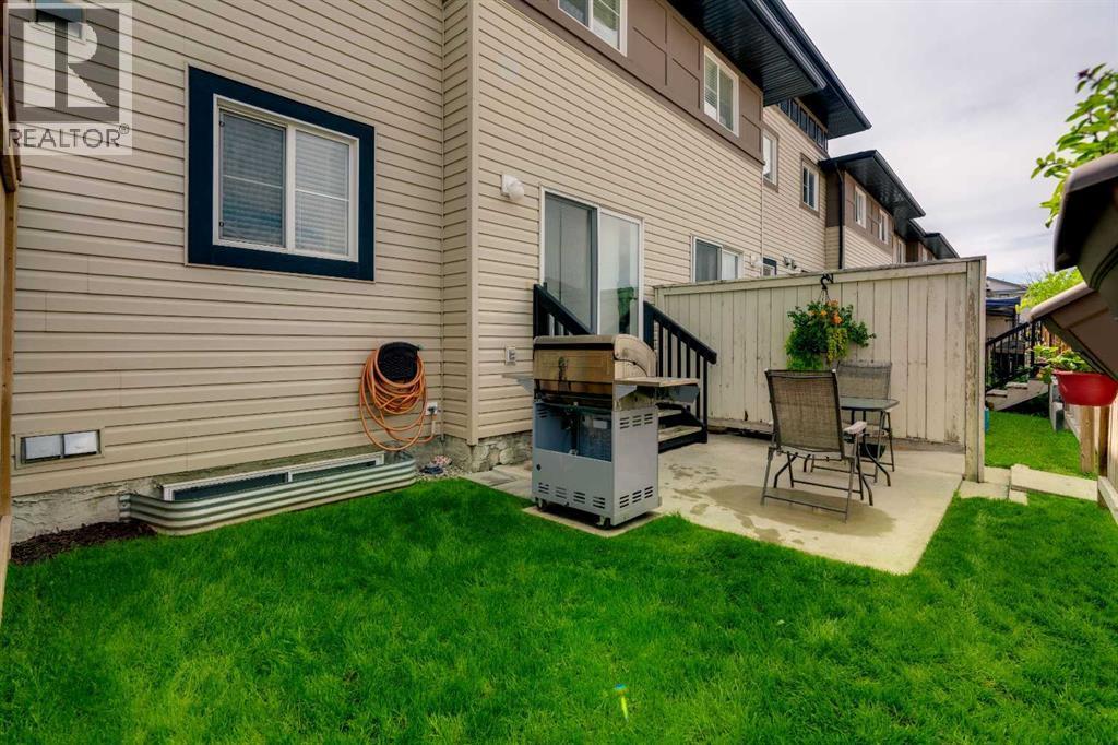 86 Eversyde Common Sw, Calgary, AB - Outdoor With Deck Patio Veranda With Exterior