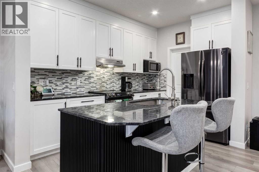 110 Sage Bank Grove Nw, Calgary, AB - Indoor Photo Showing Kitchen With Upgraded Kitchen