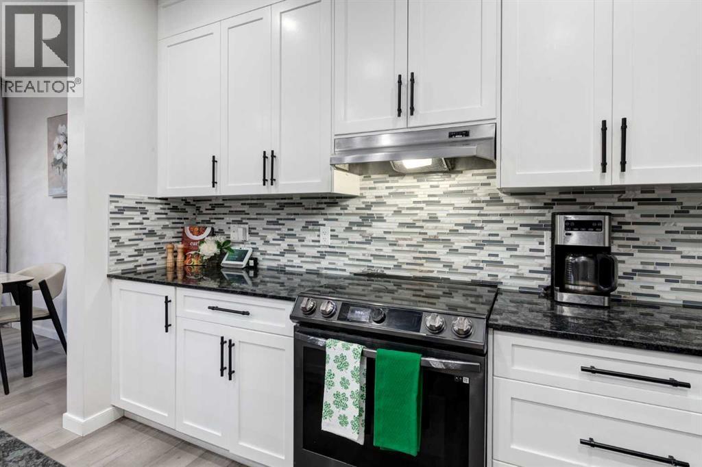 110 Sage Bank Grove Nw, Calgary, AB - Indoor Photo Showing Kitchen With Upgraded Kitchen