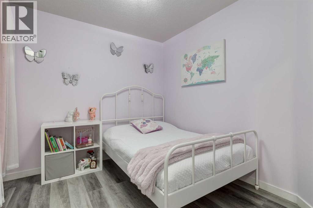 110 Sage Bank Grove Nw, Calgary, AB - Indoor Photo Showing Bedroom