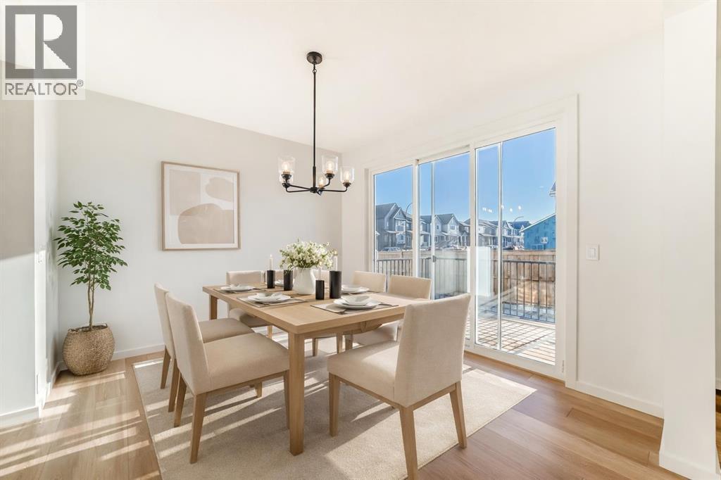 VIRTUALLY STAGED - 63 Creekside Path Sw, Calgary, AB - Indoor Photo Showing Dining Room