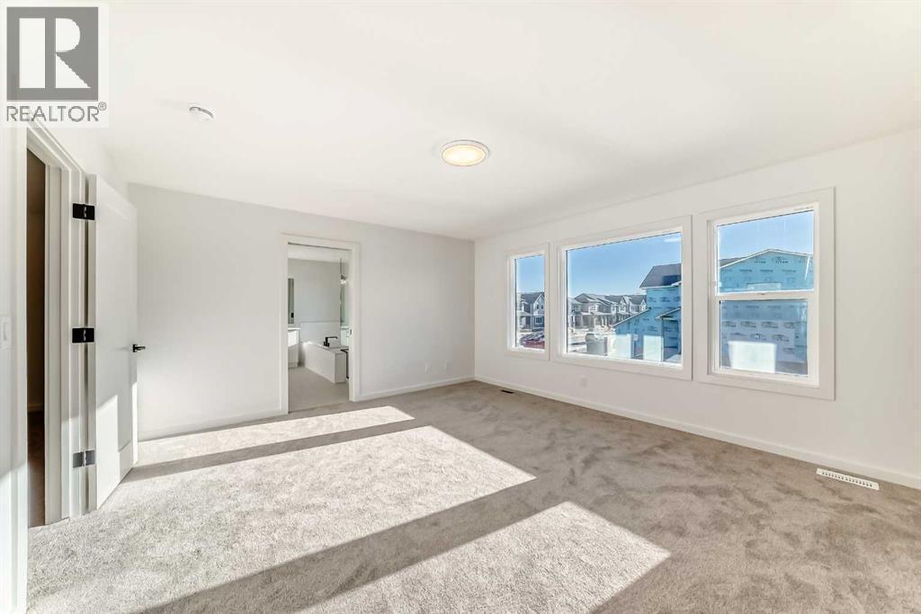 63 Creekside Path Sw, Calgary, AB - Indoor Photo Showing Other Room