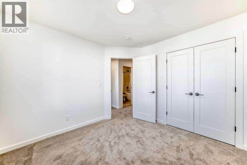 63 Creekside Path Sw, Calgary, AB - Indoor Photo Showing Other Room