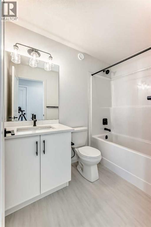 63 Creekside Path Sw, Calgary, AB - Indoor Photo Showing Bathroom