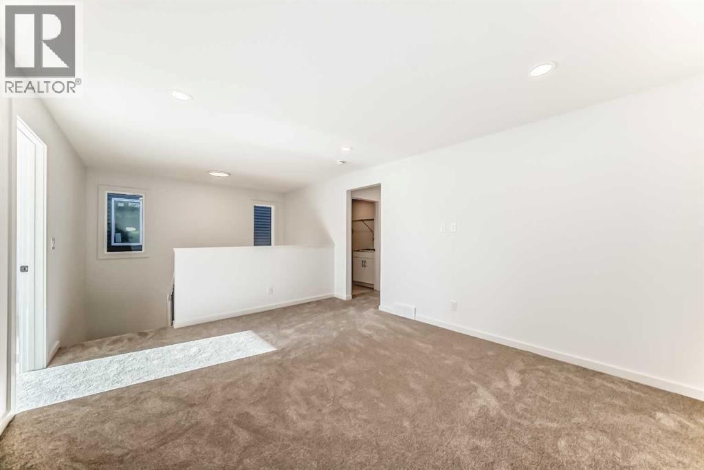 63 Creekside Path Sw, Calgary, AB - Indoor Photo Showing Other Room