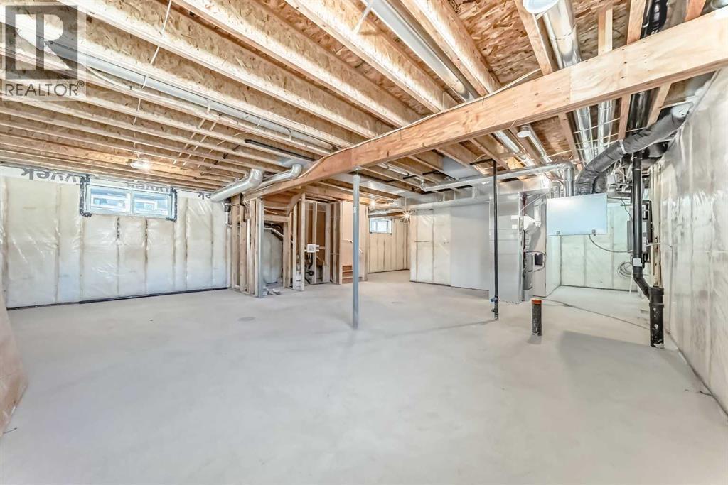 63 Creekside Path Sw, Calgary, AB - Indoor Photo Showing Basement