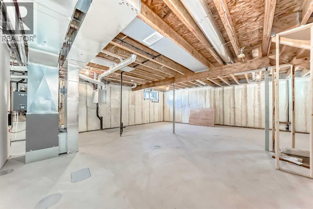 63 Creekside Path Sw, Calgary, AB - Indoor Photo Showing Basement