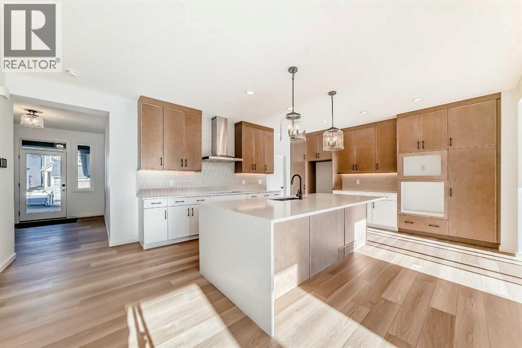 PLEASE NOTE: Kitchen appliances are included, and will be installed prior to possession - 63 Creekside Path Sw, Calgary, AB - Indoor Photo Showing Kitchen