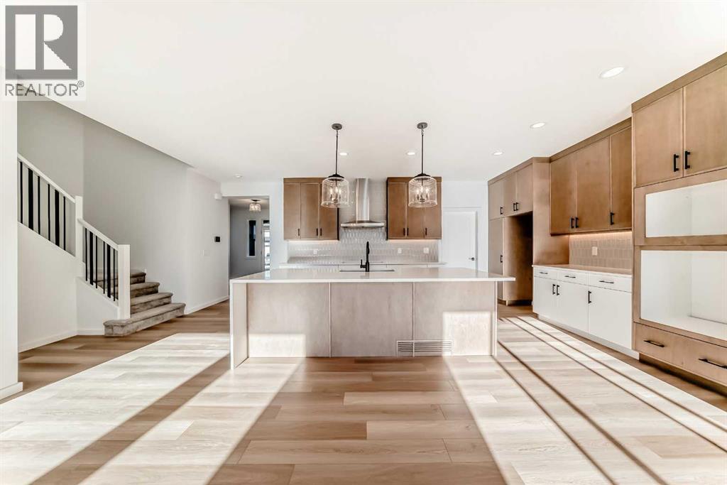 PLEASE NOTE: Kitchen appliances are included, and will be installed prior to possession - 63 Creekside Path Sw, Calgary, AB - Indoor Photo Showing Kitchen