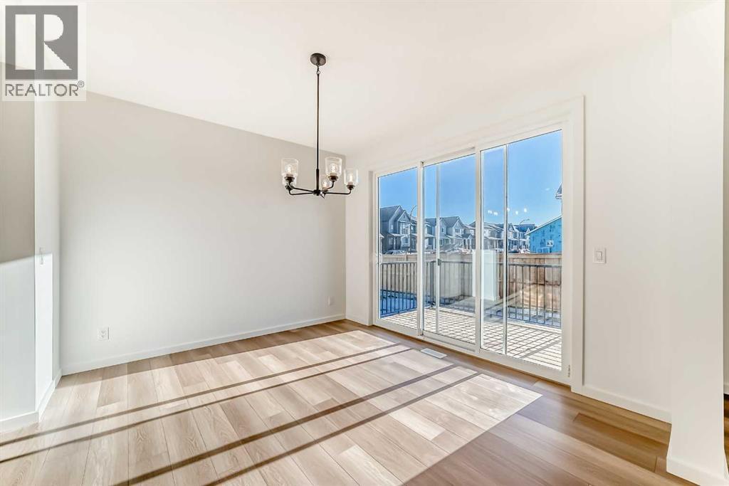 63 Creekside Path Sw, Calgary, AB - Indoor Photo Showing Other Room