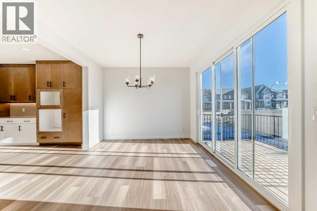 PLEASE NOTE: Kitchen appliances are included, and will be installed prior to possession - 63 Creekside Path Sw, Calgary, AB - Indoor Photo Showing Other Room