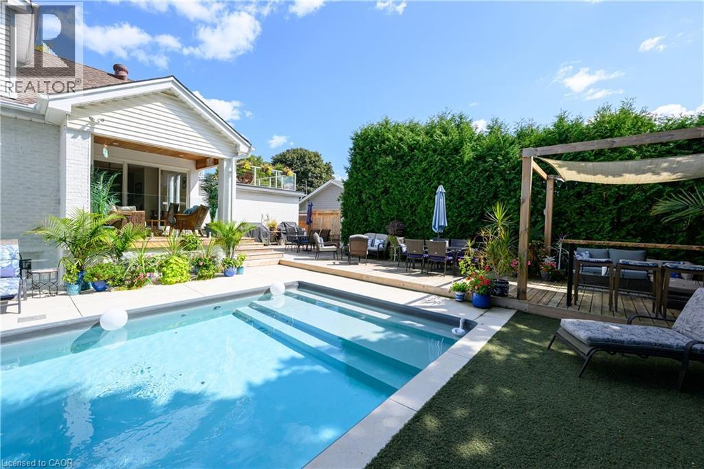 912 Boothman Avenue, Burlington, ON - Outdoor With In Ground Pool With Deck Patio Veranda